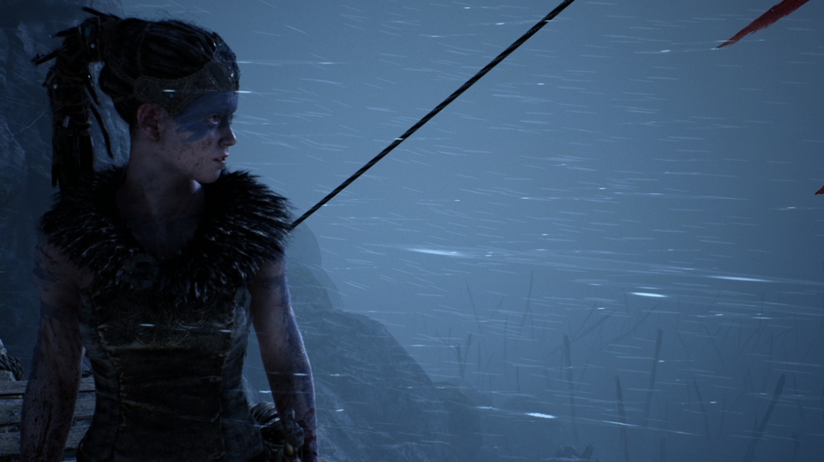 The player-character, Senua, in the game Hellblade (screenshot).